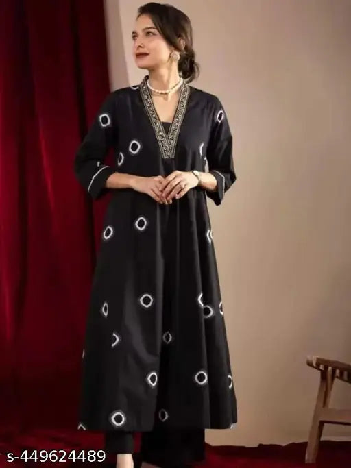 Black cotton kurta with three-quarter sleeves and printed net bottomwear from JIYAA COLLECTION JAIPUR, Indian fashion for women