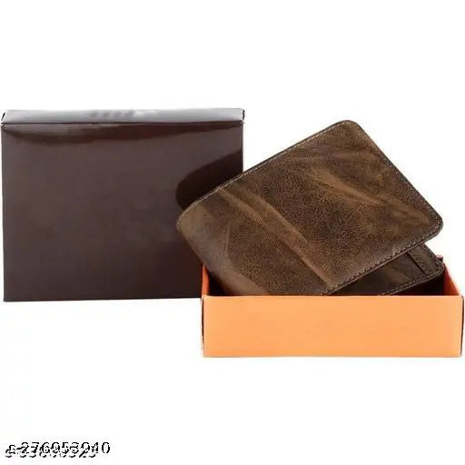 Brown faux leather bi-fold wallet with 2 compartments, featuring fashionable design, 4 card slots, a chain pocket, flip ID, 2 secret slots, and 2 currency compartments. Made in India
