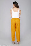 Gold cotton casual trousers, regular fit, pleats detailing, ankle length, side pockets, elasticated back, versatile for daily wear or travel