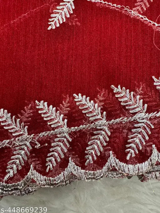 Silver zari embroidered super net saree with banglory silk blouse, embellished cutwork border on pallu and tussles