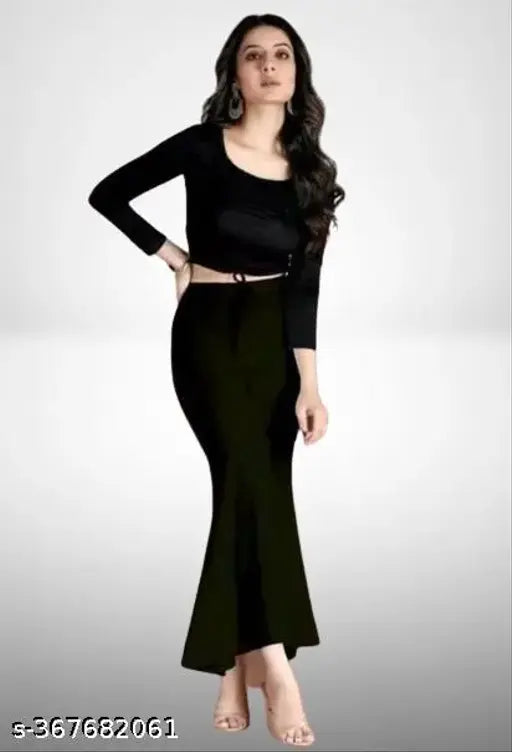 Black nylon net fish cut shapewear eliminates petticoat, sturdy waist band with drawstring. Comfortable and skin-friendly material for easy walking, side slits included. Sizes: S-XXL (India)