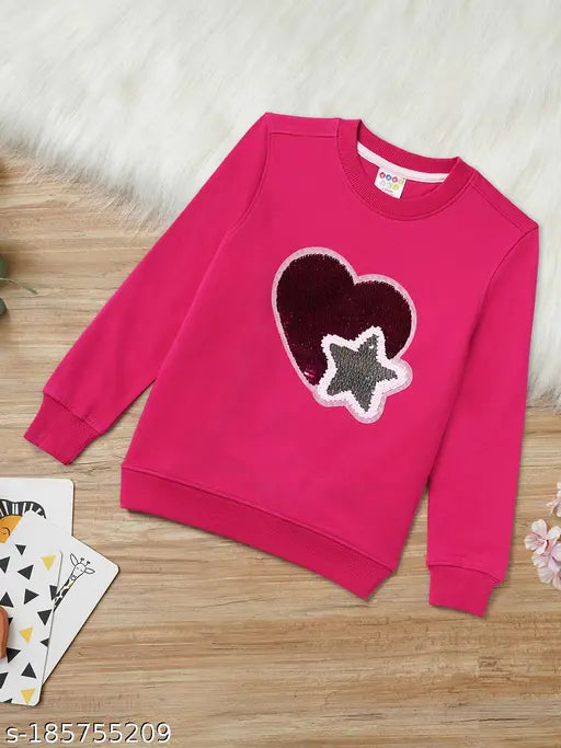 Reversible sequinned cotton sweatshirt for girls, heart pattern with long sleeves, soft, durable, no shrinkage. Sizes: 2-3yrs, 3-4yrs, 4-5yrs, 7-8yrs. Made in India