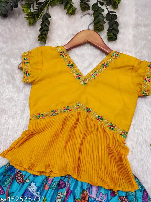 Fully stitched chiffon Lehenga Choli set for girls, self-designed botanical pattern in stitched net. Indian girl wearing traditional outfit on display stand