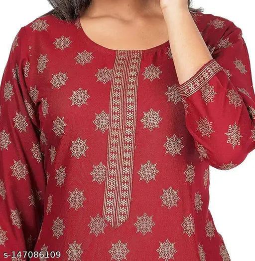Gold-printed rayon kurta with palazzo by Emre Creation, featuring three-quarter sleeves and professional tailoring