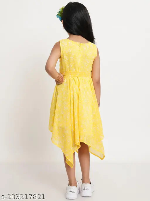 Yellow sleeveless printed net girls festive wedding dress, celebratory attire for young girls aged 9-15 months to 15 years. Polyester fabric. Made in India