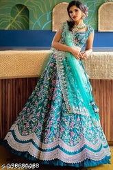 Teal foil applique lehenga set on mannequin, aqua blue silk embroidered semi-stitched Indian bridal wear