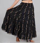 Black printed rayon long skirt with vibrant floral print, adjustable waistband for women's versatile and comfortable wear. Sizes available: 34 (waist 17in, length 40in), 36 (waist 18in, length 40in), etc. Origin: India