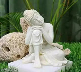 White resin thinking Buddha statue from India