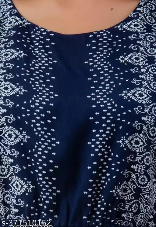 Rayon printed Nayara cut sleeveless dress, embroidered with vibrant patterns. Available in sizes S-XXL. Indian handcrafted women's fashion