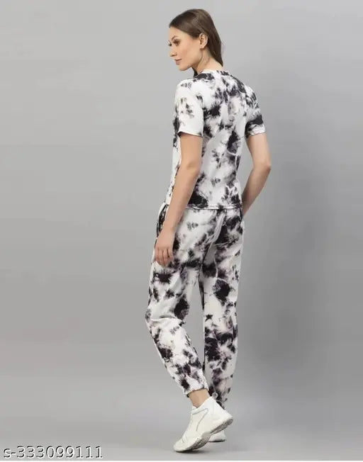 Black cotton blend women's nightsuit with short sleeves, dyed/washed pattern. Includes matching bottoms in various sizes (S-XXL). Indian-made stylish ladies loungewear for nighttime comfort