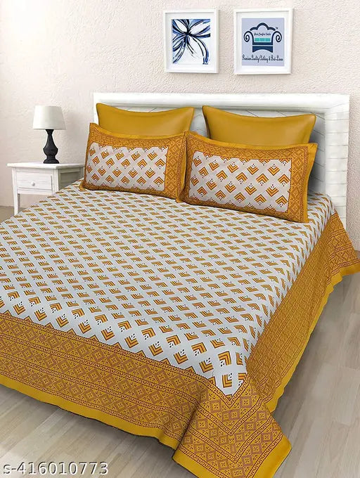 Yellow pure cotton double bedsheet with attractive texture and matching pillow covers