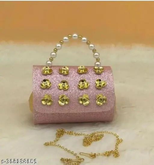 Suede embellished clutch bag (6 in x 4 in), FANCY CLUTCH GIRLS; Resin embellished clutch bag (8 in x 5 in), FANC YGIRL CLUTCH. Shiny glitter golden chain purses for girls, perfect for parties and special occasions. Made in India