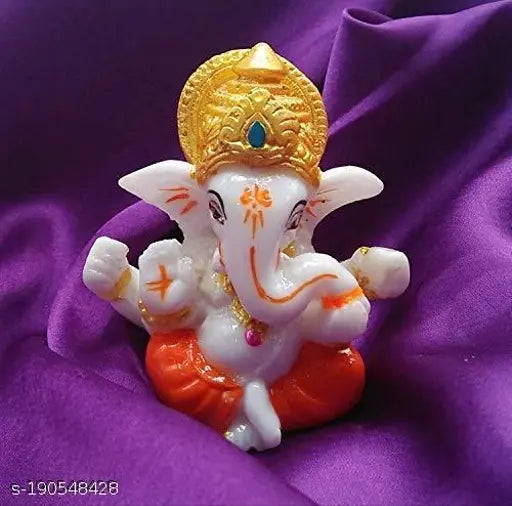 Orange marble Ganesha idol for car dashboard (9cm x 8cm x 6cm). Ideal for home decor, gifts, or office