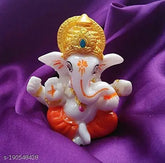 Orange marble Ganesha idol for car dashboard, ideal for home or office decor