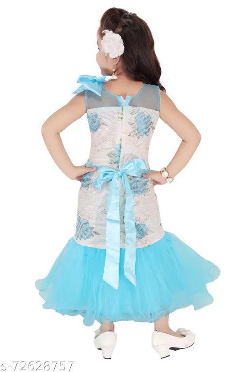 Blue net kids mermaid dress, sleeveless with printed pattern. Ideal for girls' birthday party wear, aged 3-4 to 8-9 years. Handcrafted in India