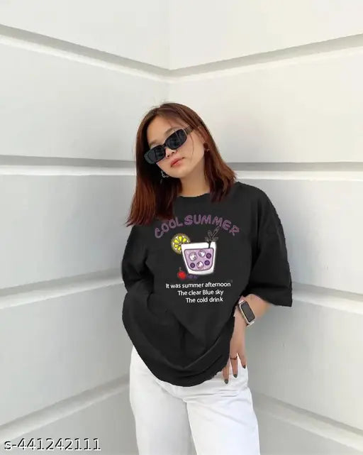 Black oversized cotton t-shirt with sinker, printed net pattern, three-quarter sleeves, biowash. Indian apparel brand Myali." (125 characters)