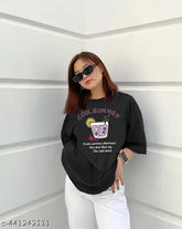 Black oversized cotton t-shirt with sinker, printed net pattern, three-quarter sleeves, biowash. Indian apparel brand Myali." (125 characters)