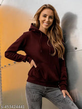 Women's cotton blend kangaroo pocket hoodie in solid color, Lazychunks regular fit on display rack