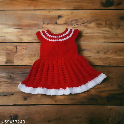 Handmade woolen baby frock, sleeveless self-design by Vardhman Wool. Elegant toddler wear, India origin