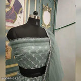 Embroidered net lehenga set with ruffle dupatta and choli, free size (42" waist, 44" length), trending Indian fashion