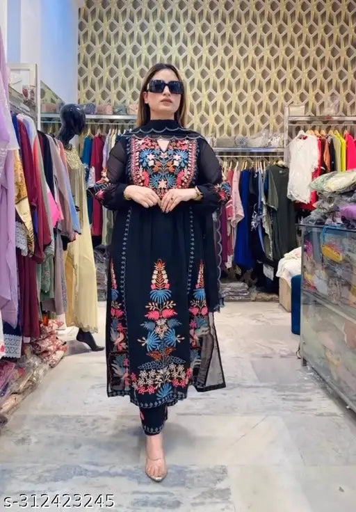 Party wear look top palazzo set & dupatta in heavy faux georgette, featuring riyal mirror and embroidery work, perfect for Indian festivities