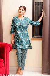 Teal printed cotton nightsuit for ladies, comfortable sleepwear with three-quarter sleeves and pyjama bottoms, easy to care for and designed for a peaceful night's rest