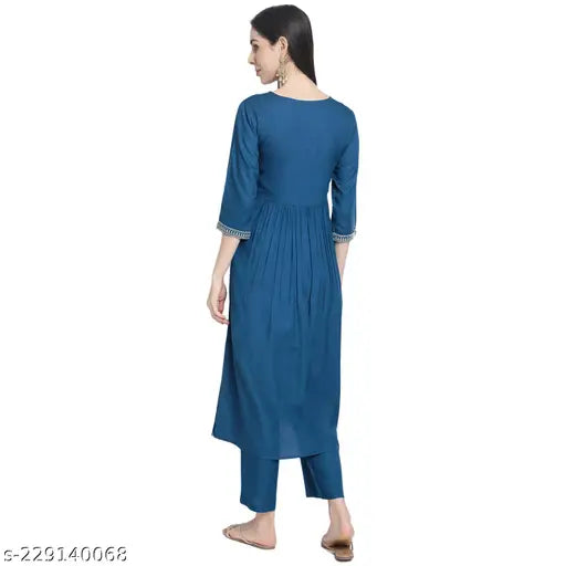 Rayon embroidered Nayra Cut Kurta Palazzo set in premium quality, solid net, perfect for weddings and parties. Indian-origin