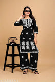 Black rayon kurta set with embroidered net pants, three-quarter sleeves. Indian traditional clothing for women, sizes M-XXXL