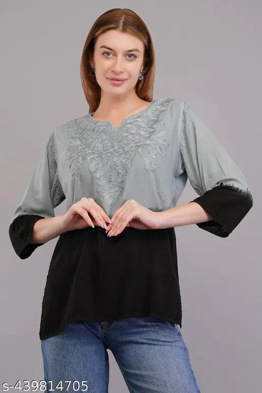 Hand-embroidered Rayon short kurta in Lucknow Chikankari style, featuring trendy Kashmiri embroidery. Indian handcrafted attire for women's fashion, suitable for casual, festive, and office wear." (125 characters)