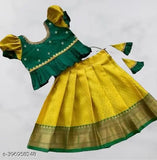 Vibrant pink silk lehenga choli with Zari work, ideal for South Indian weddings or festivals