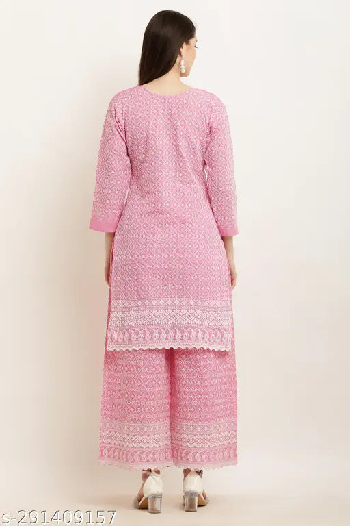 Women's pink cotton blend kurta with embroidered net palazzo set, three-quarter sleeves, available in S-XXXL sizes for various bust and waist measurements. Ethnic wear from India
