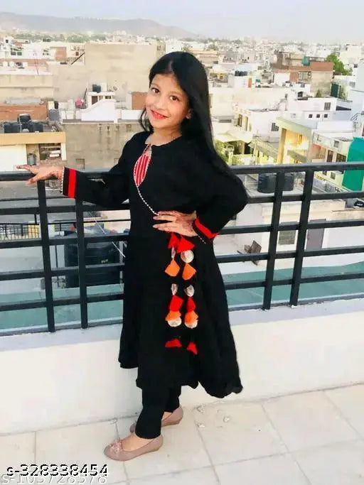 Rayon kurta suit set for girls, solid pattern and long sleeves in various sizes from 5-6 years to 13-14 years. India origin
