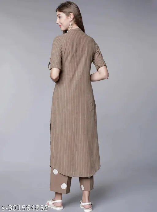 Women's cotton printed kurti pant set with palazzos, three-quarter sleeves, and vibrant print on display
