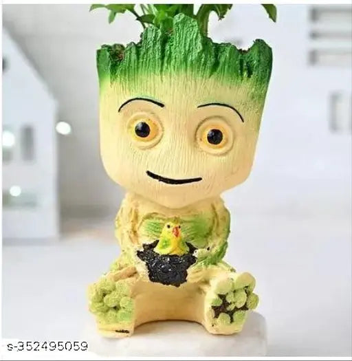 Large resin Groot figurine vase for living room, office or balcony. Premium, pollution-free, compatible with freshwater/marine environments." (107 characters)