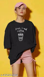 Black cotton-blend oversize women's t-shirt with 'I NEED COFFEE' print, ideal for casual wear