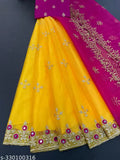 Heavy net fabric Lehenga with multi-thread embroidery and mirror work, silk blouse on mannequin