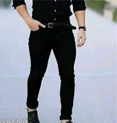 Black polycotton stretchable men's slim mid-rise jeans, comfortable fit for any occasion. Breathable fabric and anti-corrosive buttons for best quality experience. Perfect for casual, party, or office wear