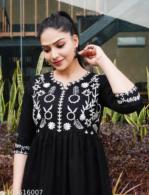 Black rayon fit-and-flare kurti with embroidered pattern, three-quarter sleeves. Women's size L (bust 40in), XXL, XXXL. Indian design