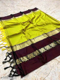 Lemon and brown brocade cotton silk saree with elephant design, traditional Indian bridal wear accessory on mannequin