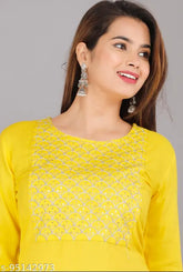 Yellow rayon straight embroidered kurta with three-quarter sleeves, intricate Indian craftsmanship. Model wears size M (38in bust, 42in length)