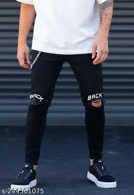 Denim men's knee-cut jeans with back print, fit fire design, two pockets and ripparts. Made of Indian denim for casual and party wear