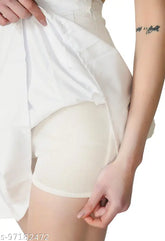 Polyester solid net western mini pleated skater skirt with attached shorts, high-waisted and above knee, versatile fashion for parties, casual outings, offices, cycling - available in various colors and patterns. Size 24/XS (Waist: 24in, Length: 17.5in), made in India