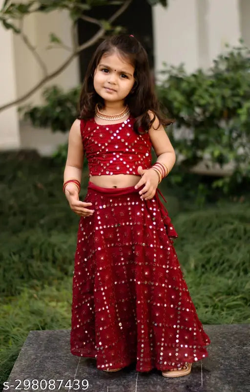 Embellished georgette and tissue lehenga choli set for kids Navratri festival, traditional design with embroidered patterns, sizes range from 7-13 years