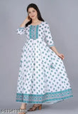 Green rayon kurti with white, printed combo, three-quarter sleeves. M (38in), L (40in), XL (42in), XXL (44in), XXXL (46in), 4XL (48in). Indian traditional clothing on display