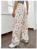 Printed net lycra dhoti pant for women with pocket, trendy formal cream cargo pants from India (size 34/waist 34in/length 38in)
