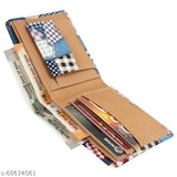 Blue faux leather wallet with 2 compartments, printed net pattern, and stitching detail. Imported from India. Perfect for everyday use or as a gift