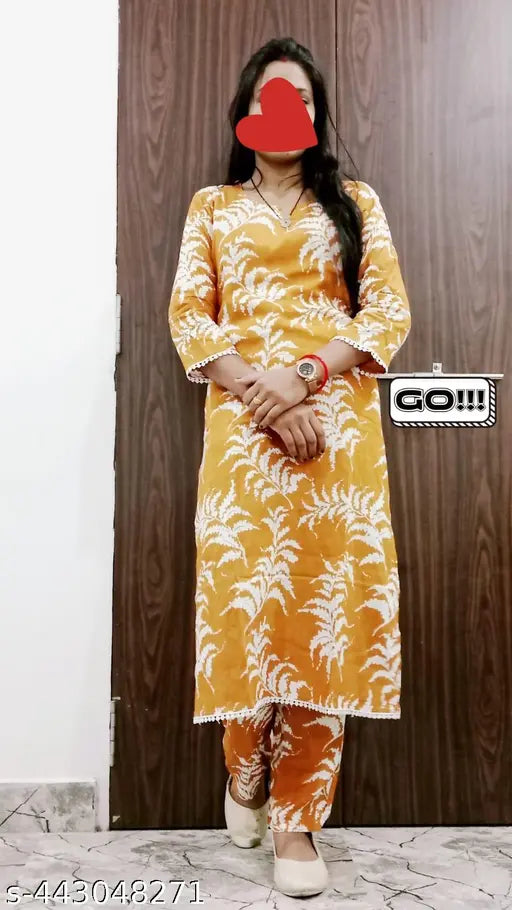 Orange rayon coord set, printed net kurta with palazzos and three-quarter sleeves