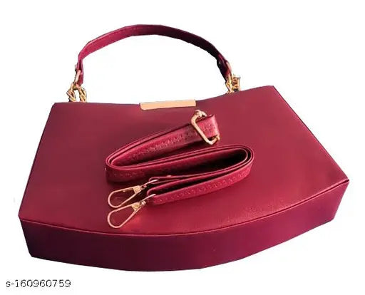 Maroon faux leather slingbag, lightweight and cross-body design, features one shoulder strap and a small hand strap, perfect for summer outings