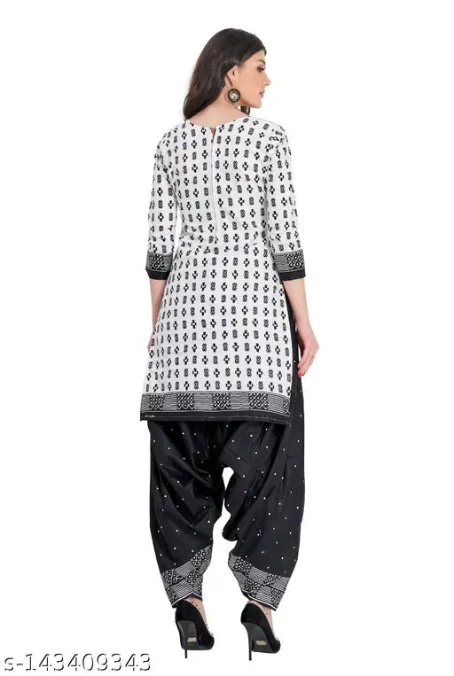 Stitched 100% cotton printed salwar suit set with dupatta and bottomwear, featuring three-quarter sleeves. Available in sizes L to 4XL for daily or casual wear, originating from India