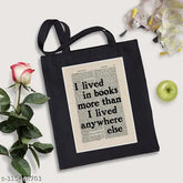 Black canvas tote bag with 'I Lived In Books' print, great for everyday carry